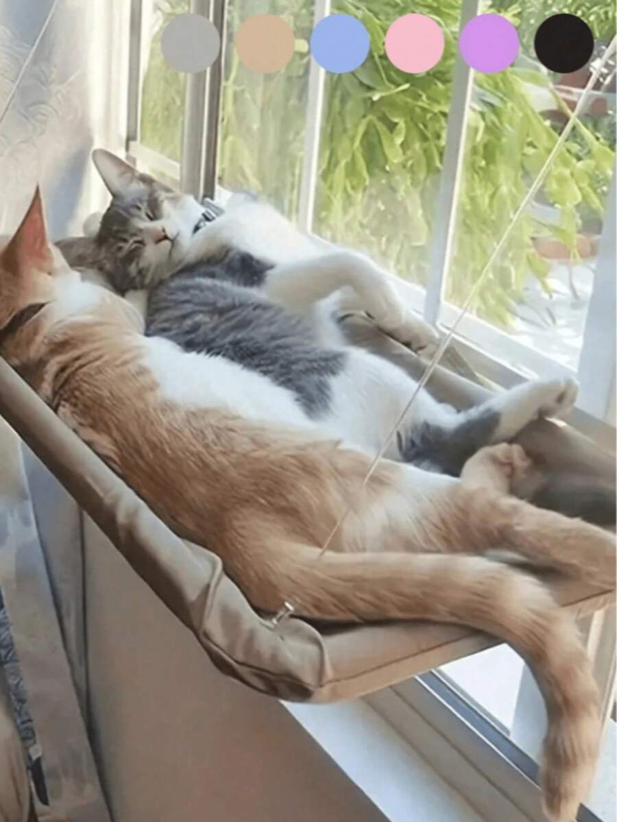 Suspended cat window hammock bed with sturdy ABS frame, mounting brackets, and cozy blanket installed on a glass window.