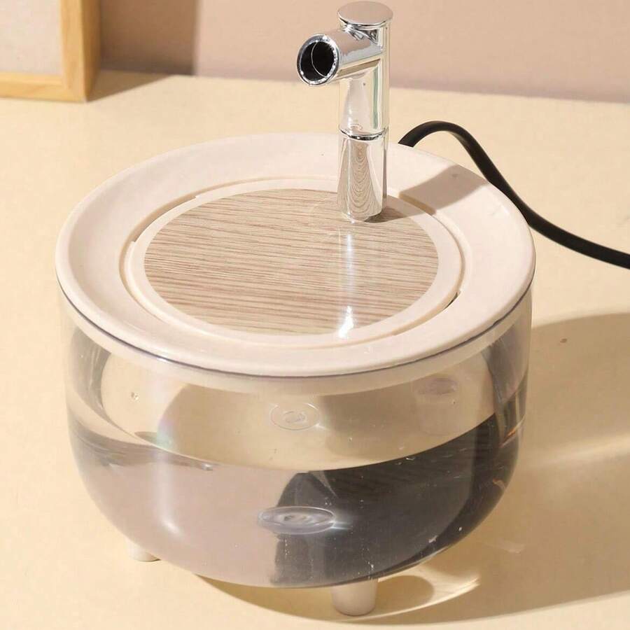 White 1000ml automatic circulating pet water fountain with USB power connection for cats and dogs.