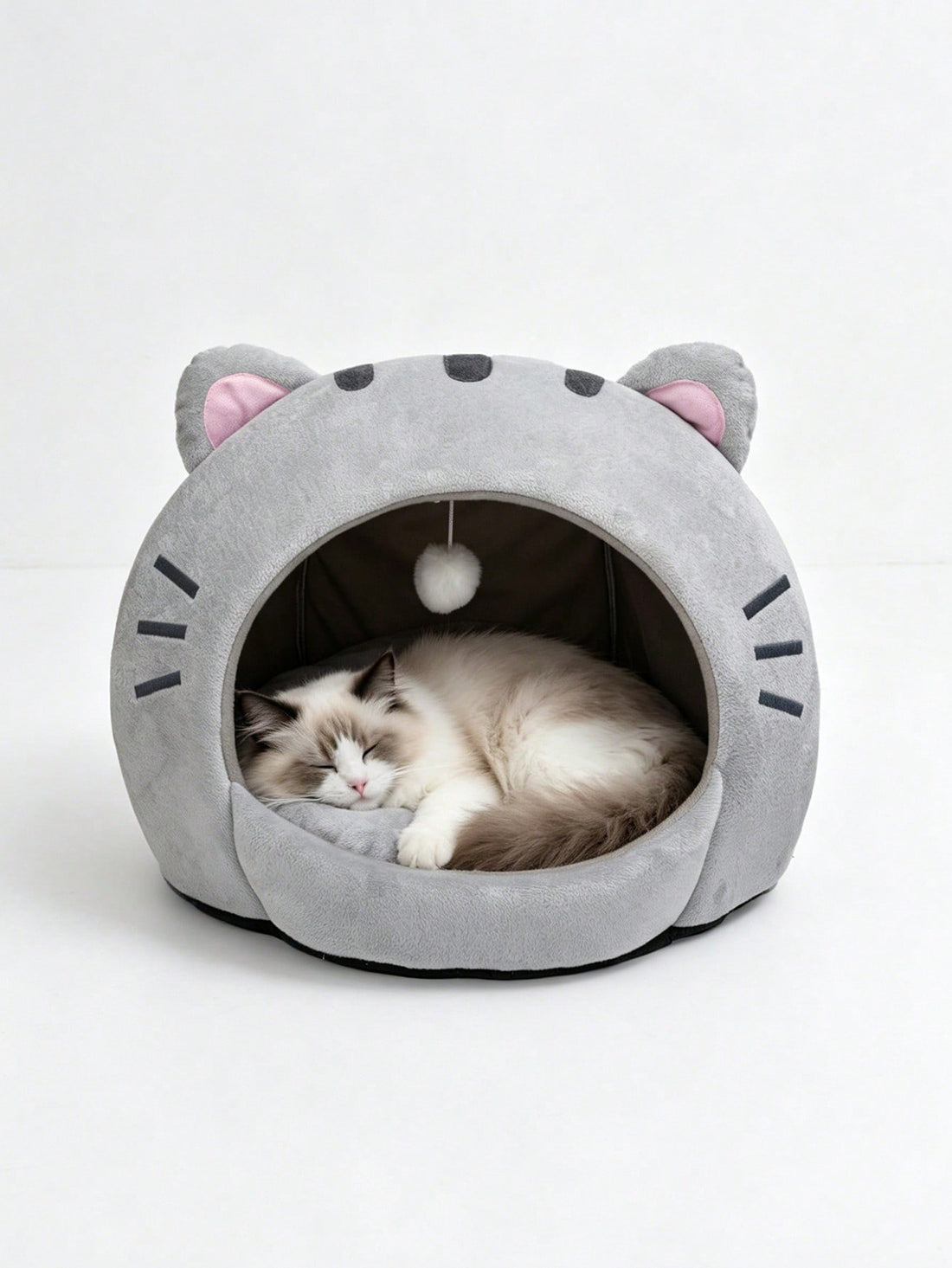 Multicolor soft cat bed featuring a cartoon pattern design suitable as a comfortable sleeping basket for cats and dogs.