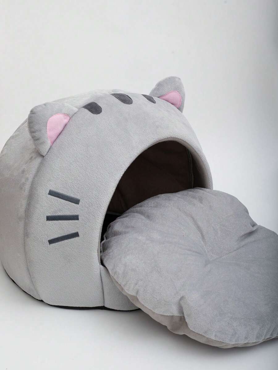 Multicolor soft cat bed featuring a cartoon pattern design suitable as a comfortable sleeping basket for cats and dogs.
