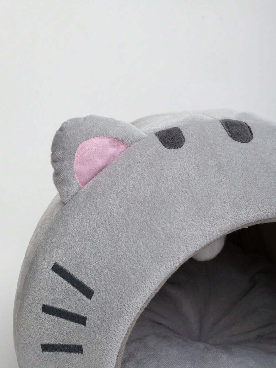 Multicolor soft cat bed featuring a cartoon pattern design suitable as a comfortable sleeping basket for cats and dogs.