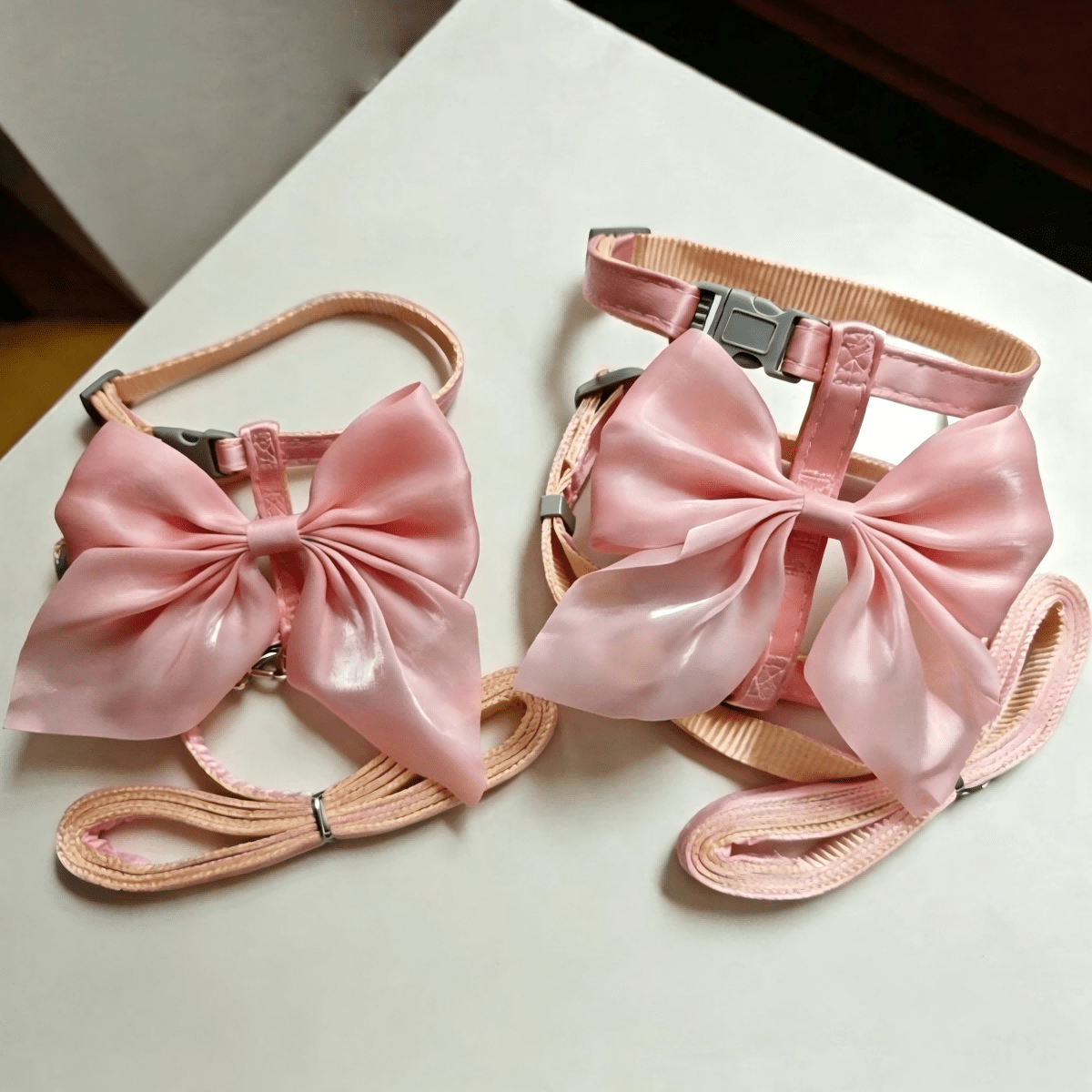 Multicolor polyester pet harness with glossy 3D big bow decoration and adjustable chest strap for cats and dogs.