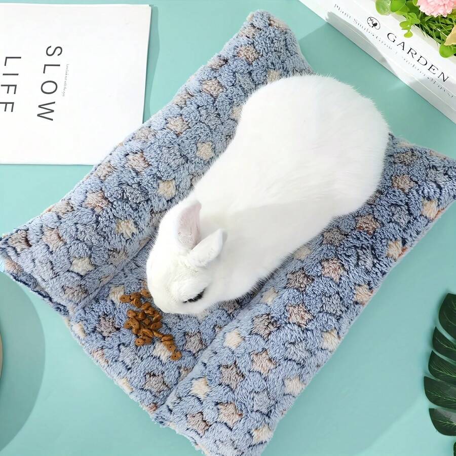 Navy blue soft plush wrap-around pet bed with raised edges for rabbits and small animals.