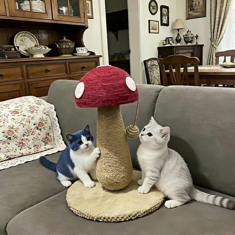 Small bright red mushroom-shaped sisal cat scratching post and climbing frame toy for cats.