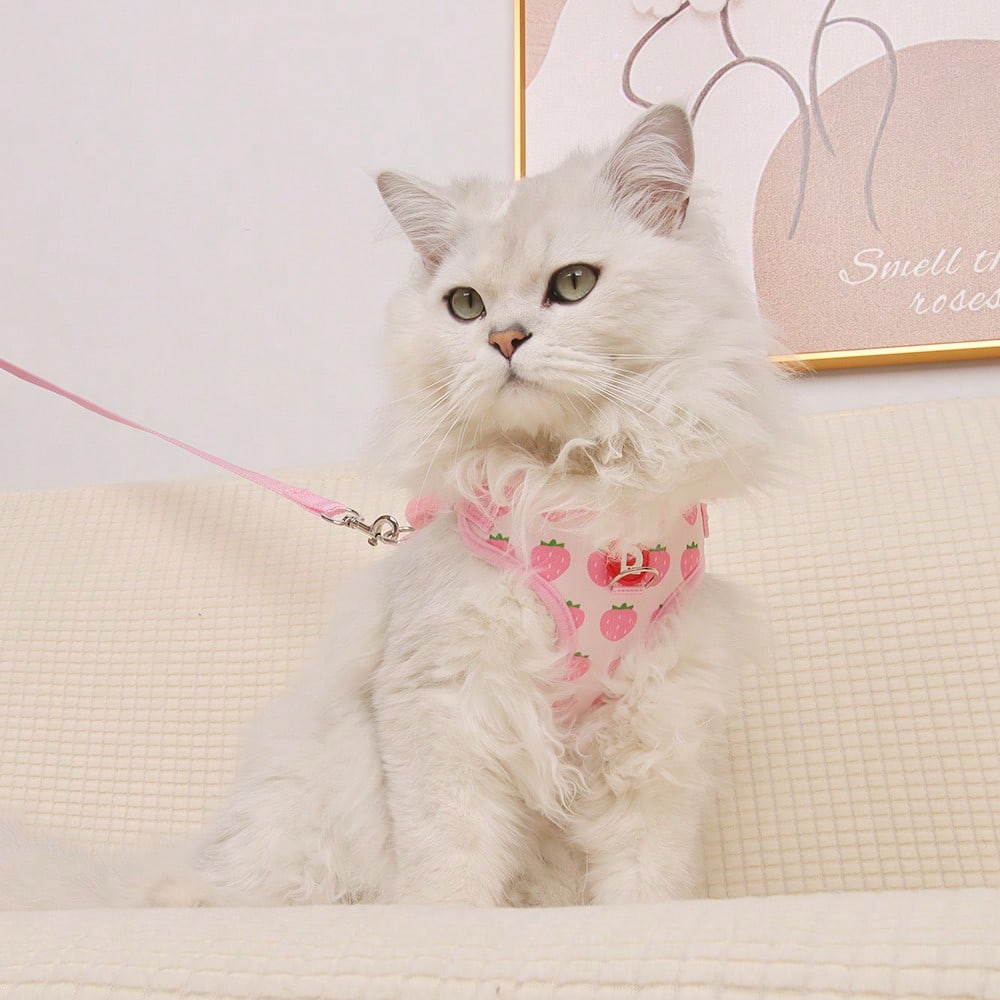 Yellow polyester pet harness and leash set with fruit and vegetable pattern, adjustable vest design for cats and small dogs for outdoor walking.