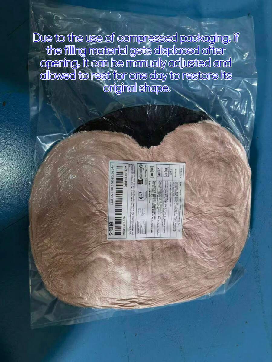 Pink round plush pet bed made of soft short plush material for small and medium cats and dogs.
