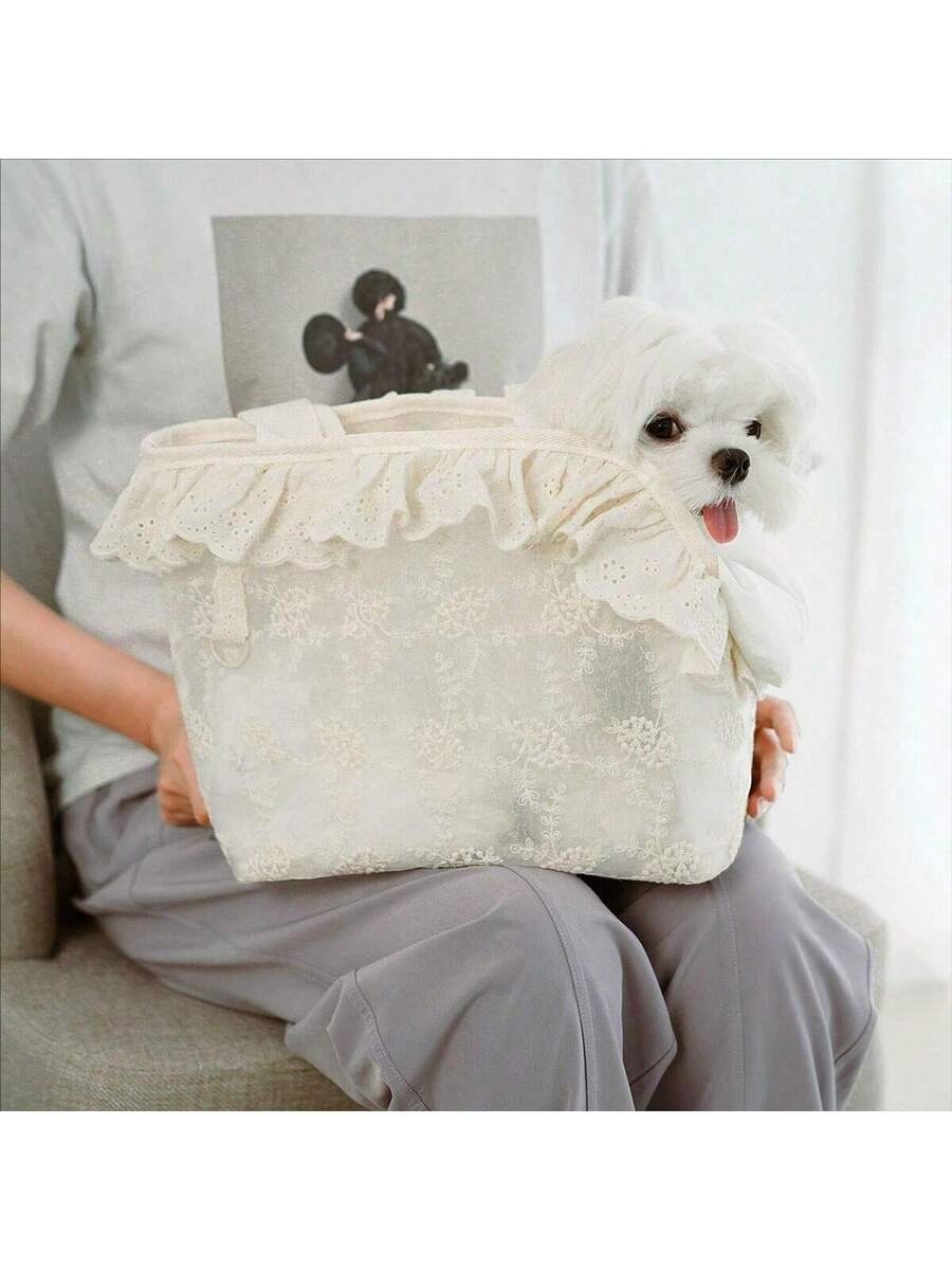 Beige soft-sided pet carrier tote bag featuring lace design and shoulder straps for small dogs and cats.