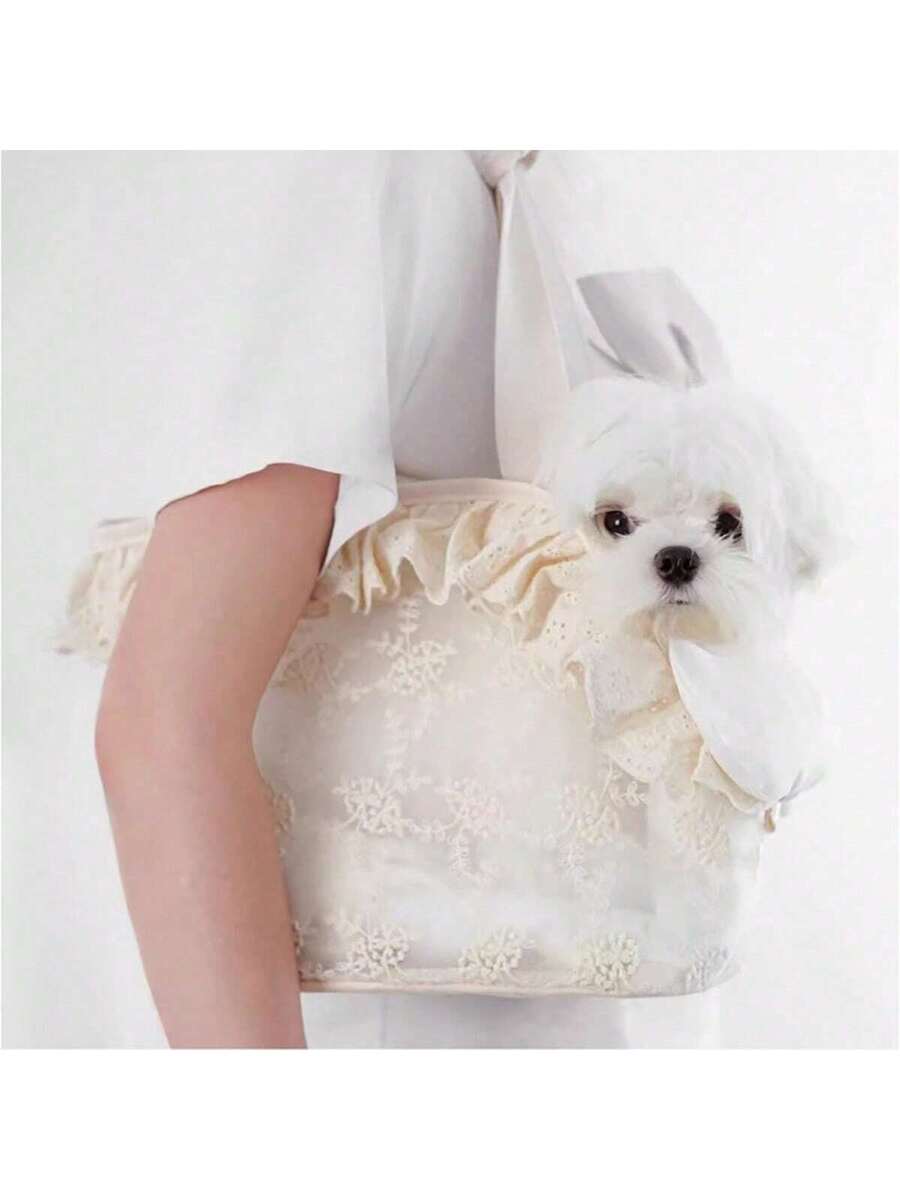 Beige soft-sided pet carrier tote bag featuring lace design and shoulder straps for small dogs and cats.