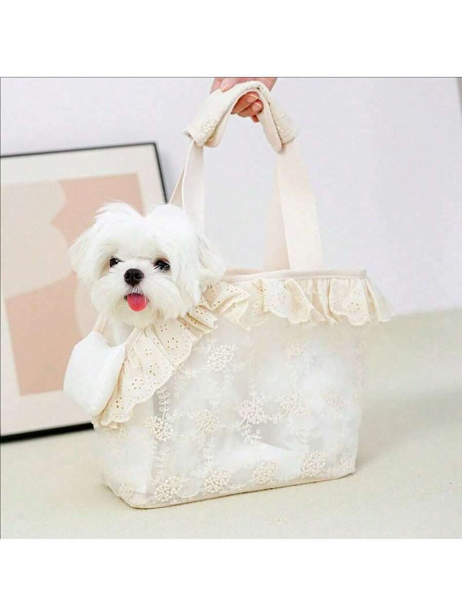 Beige soft-sided pet carrier tote bag featuring lace design and shoulder straps for small dogs and cats.