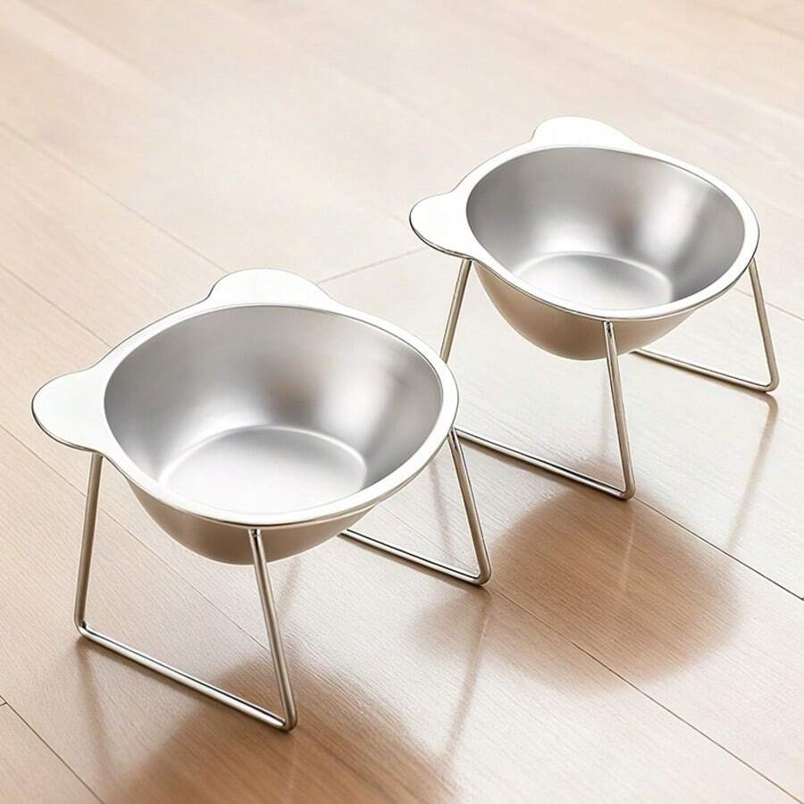Four-piece elevated stainless steel cat bowl set with two 15-degree tilted stands for indoor cats and dogs.