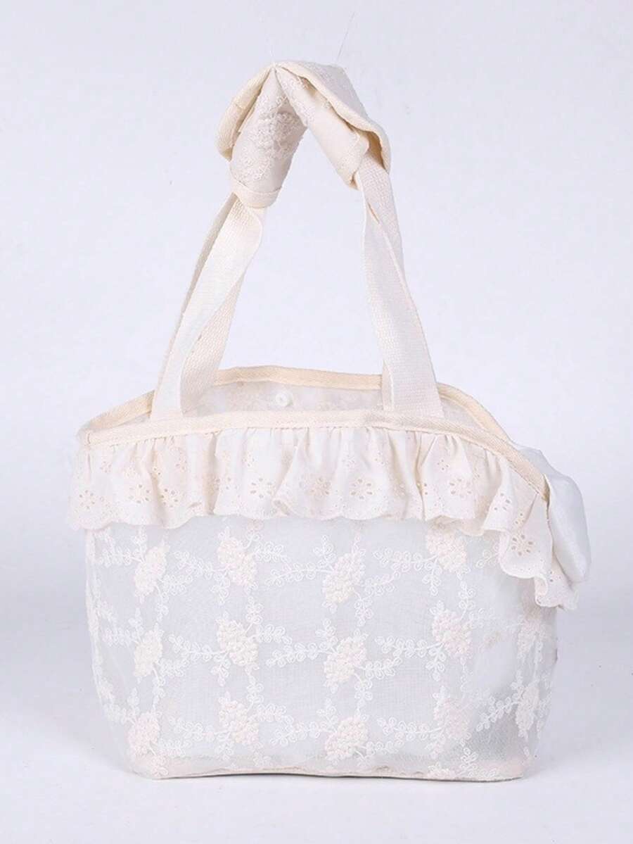 Beige soft-sided pet carrier tote bag featuring lace design and shoulder straps for small dogs and cats.
