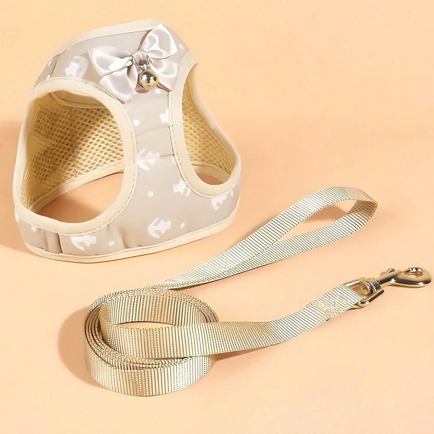 Beige anchor-shaped cat and dog leash and harness set with geometric graphic pattern, designed for small pets and made from polyester.