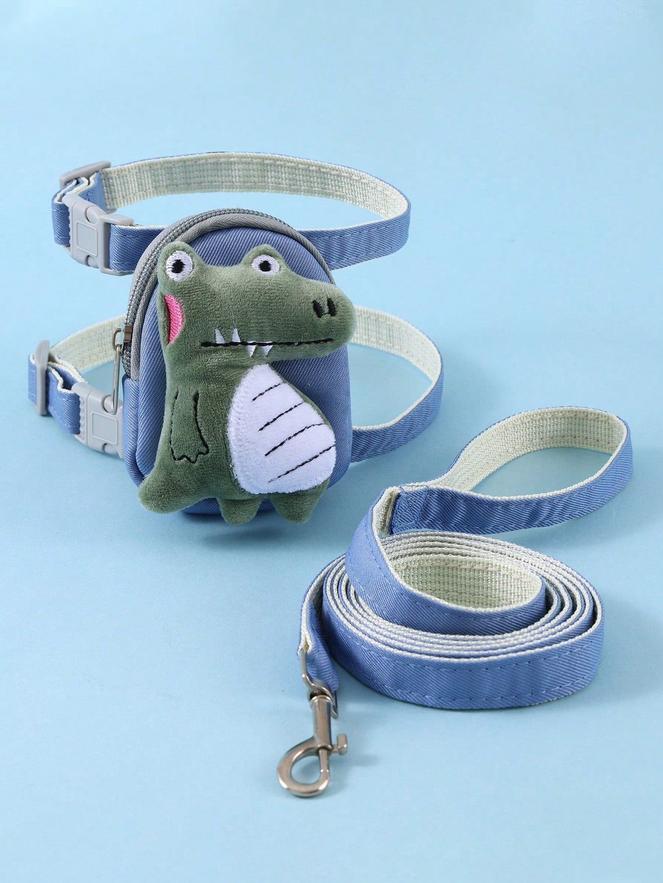 Multicolor cartoon 3D plush dinosaur pet harness and leash set with adjustable polyester harness, pouch, collar, leash, and keychain pendant for cats and dogs.