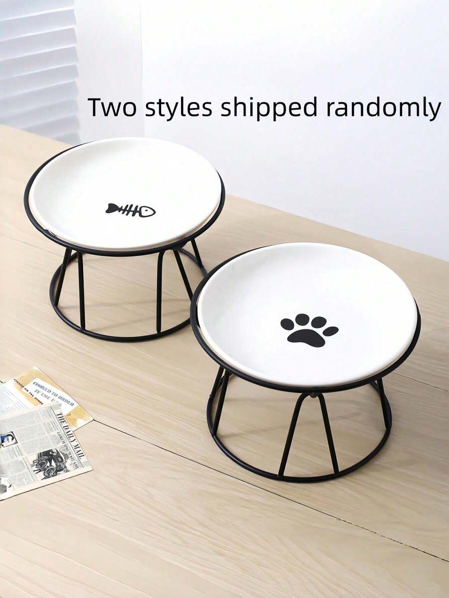 White elevated ceramic pet bowl set with non-slip stand featuring cat paw and fishbone designs