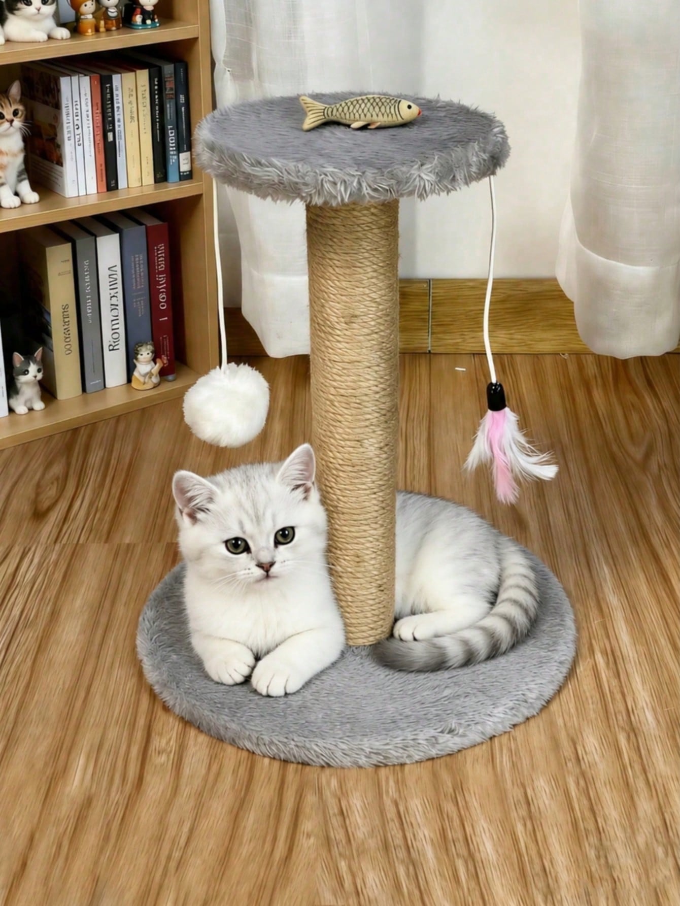 Brown mini sisal cat scratching post and kitten climbing tower with interactive plush ball and feather toys.