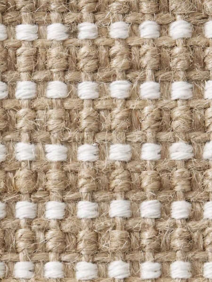 Vertical sisal cat scratching board mounted as a sofa protector with hook and loop fasteners for cats.