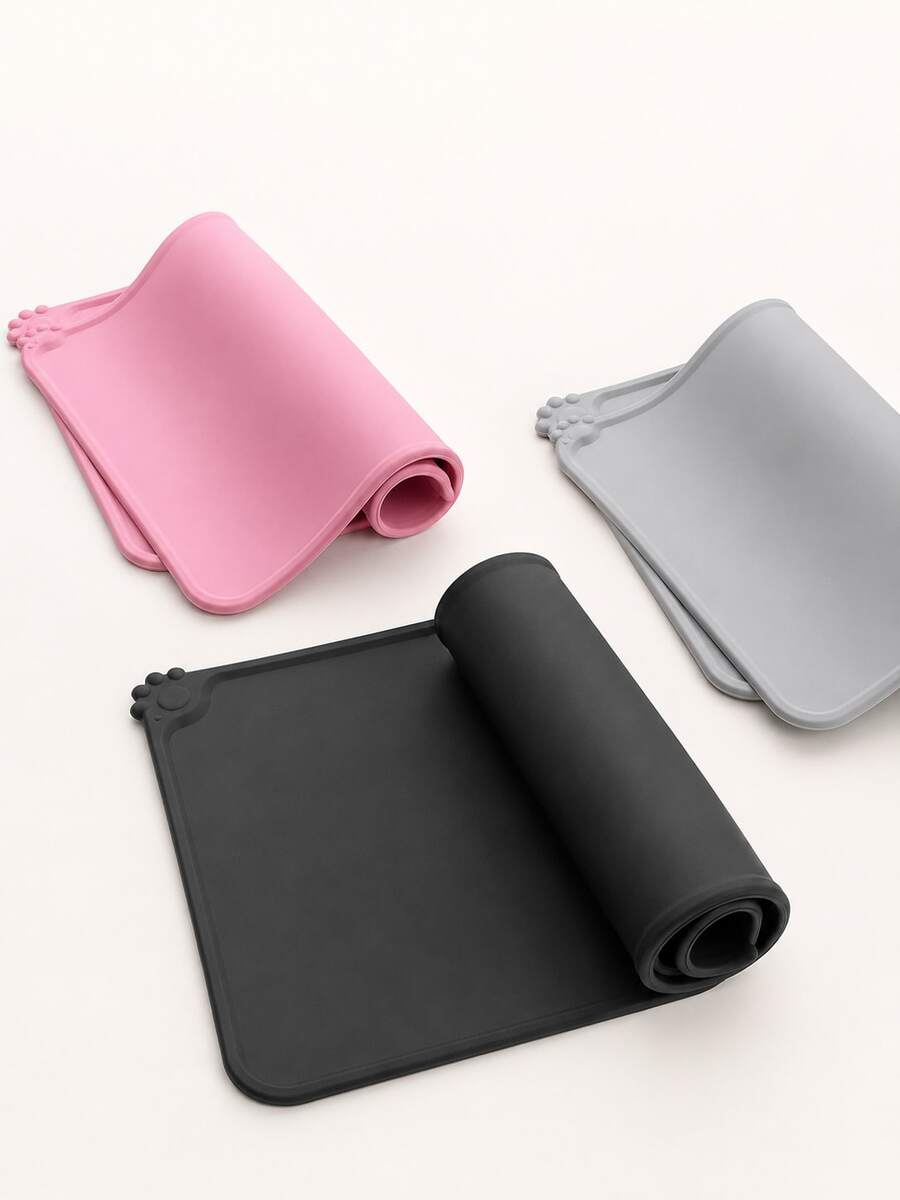 Multicolor waterproof silicone pet feeding mat designed for cats and dogs, featuring a plain non-slip surface to prevent food and water spills.