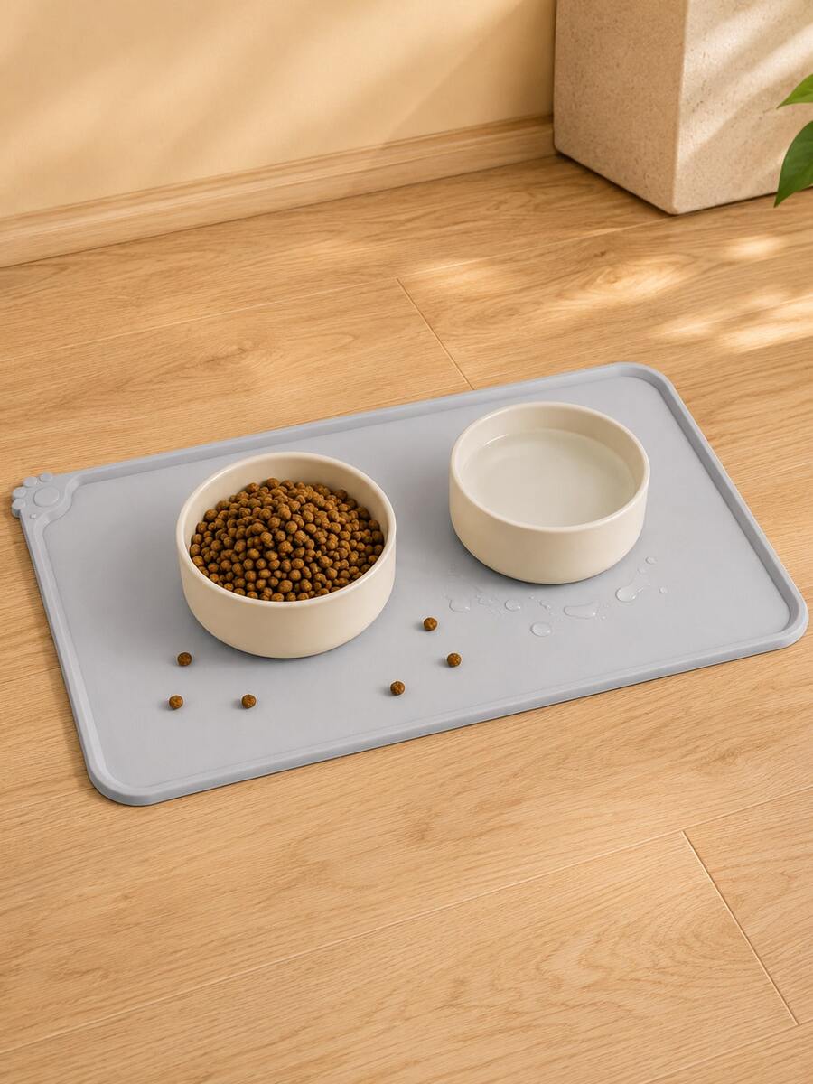 Multicolor waterproof silicone pet feeding mat designed for cats and dogs, featuring a plain non-slip surface to prevent food and water spills.