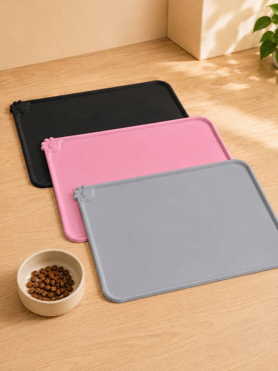 Multicolor waterproof silicone pet feeding mat designed for cats and dogs, featuring a plain non-slip surface to prevent food and water spills.