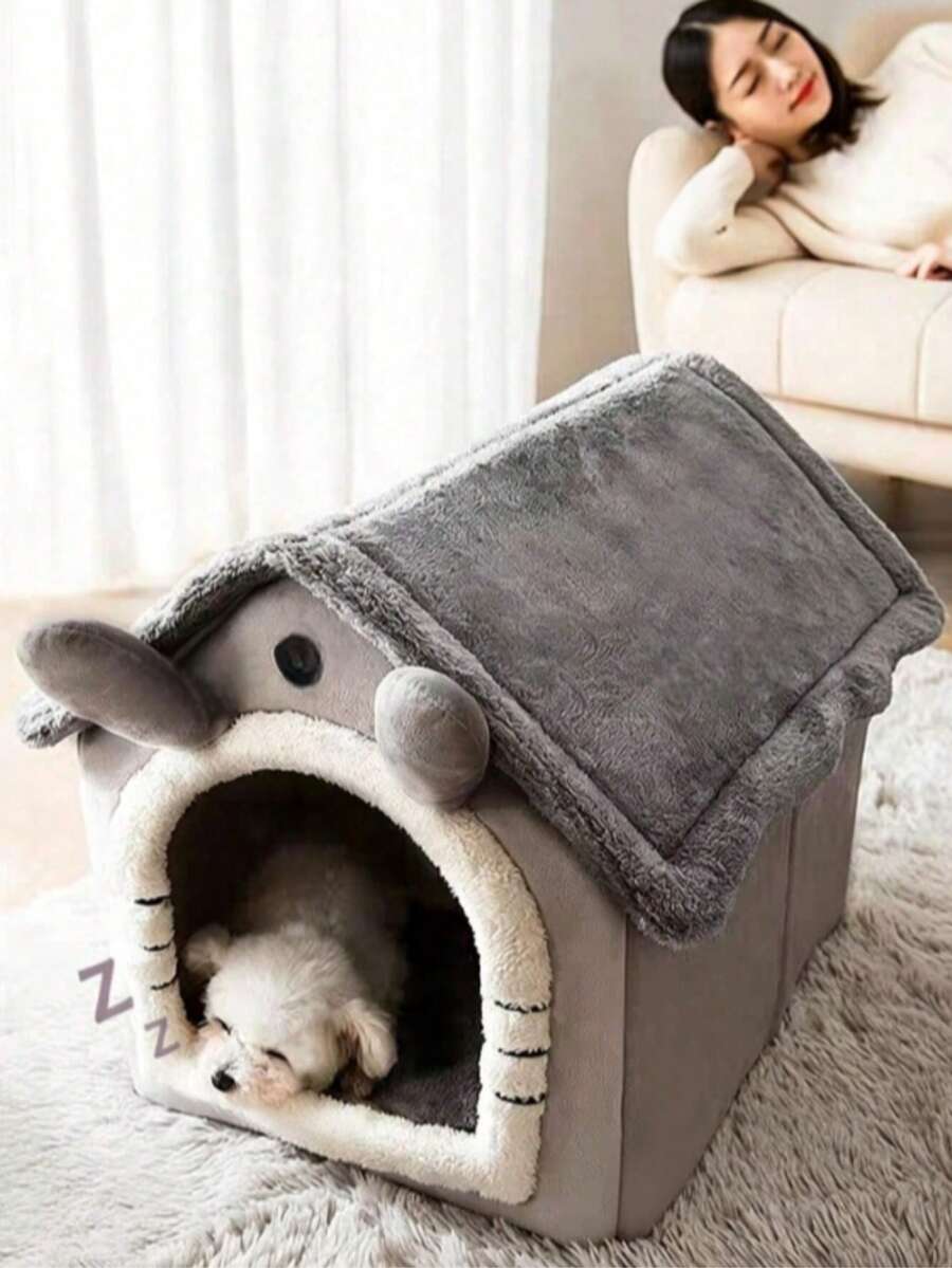 Grey house-shaped semi-enclosed pet villa bed with cartoon pattern for cats and dogs, crafted from soft polyester material.