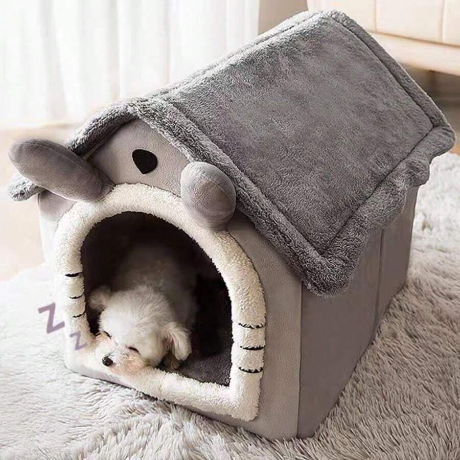 Grey house-shaped semi-enclosed pet villa bed with cartoon pattern for cats and dogs, crafted from soft polyester material.