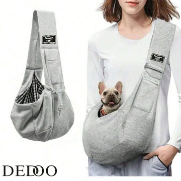 Multicolor polyester pet sling carrier bag with animal pattern for carrying cats and dogs during outdoor travel.