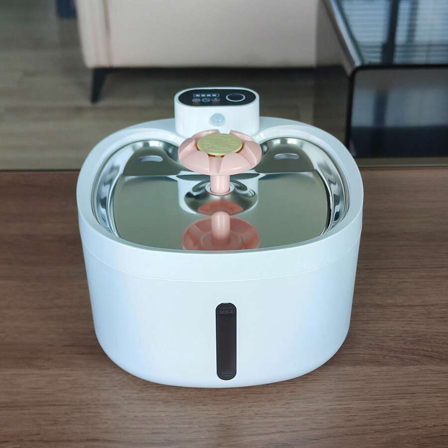 Multicolor 88oz 2.6L wireless automatic cat water fountain with motion sensor and rechargeable battery powered ABS structure.