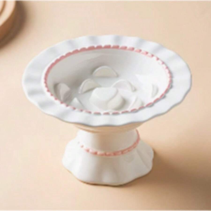 Elevated cream white ceramic slow feeder pet bowl for small pets with a 250ml capacity.