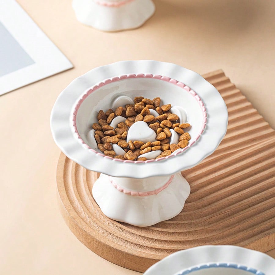 Elevated cream white ceramic slow feeder pet bowl for small pets with a 250ml capacity.