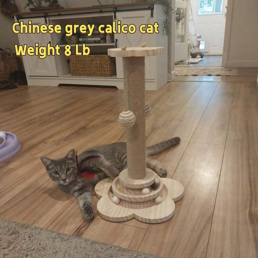 Multicolor wooden cat scratch pole activity center featuring a scratching post, two horizontal ball tracks, an interactive feather toy, and hanging sisal balls.