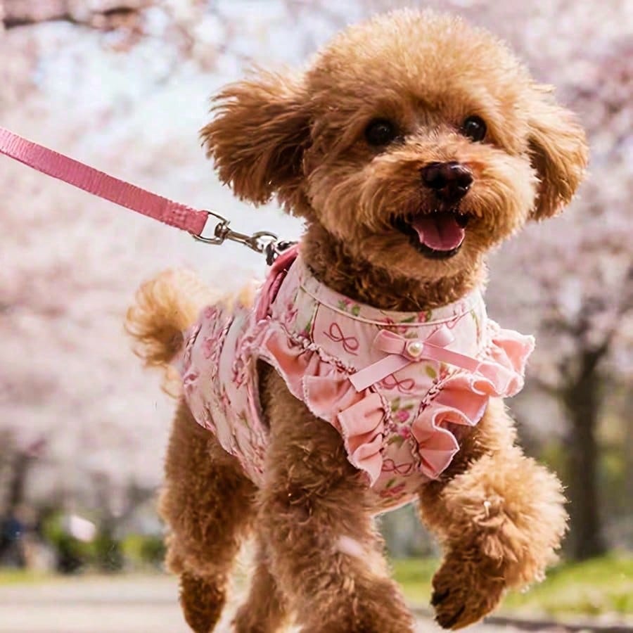 Pink polyester dog vest harness and leash set for small pets with bowknot, floral, pearl, and ruffle design plus safety snap buckle