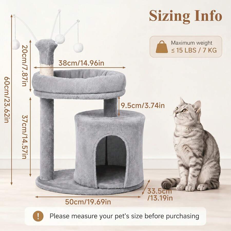 Gray 23.6-inch compact multi-level cat tree tower for indoor cats featuring a soft padded perch, cozy hideaway cave, and dangling pom-pom toy.
