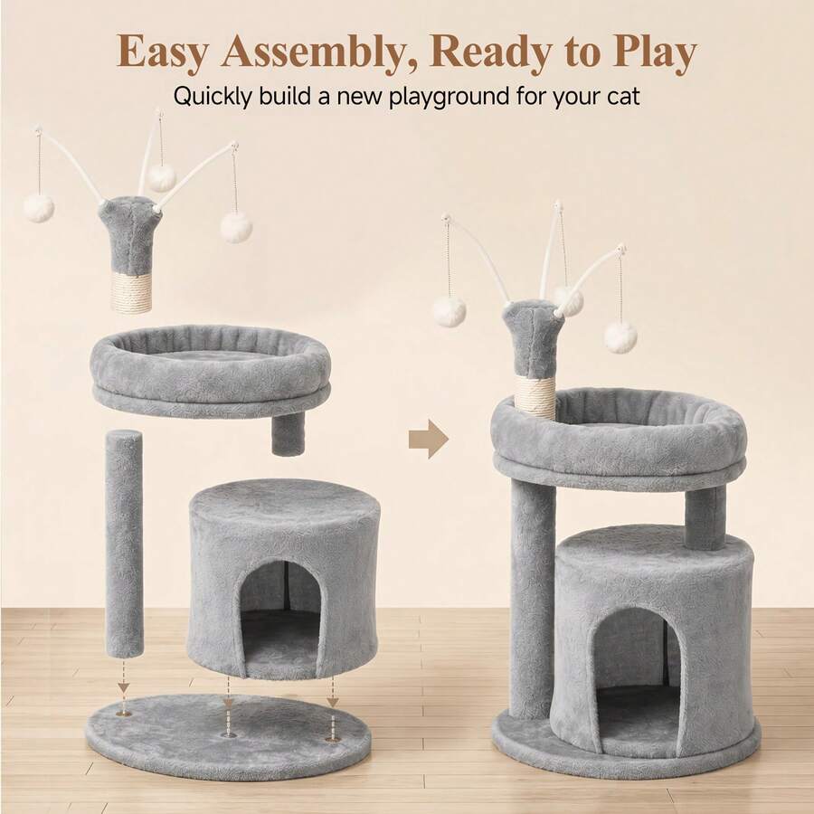 Gray 23.6-inch compact multi-level cat tree tower for indoor cats featuring a soft padded perch, cozy hideaway cave, and dangling pom-pom toy.
