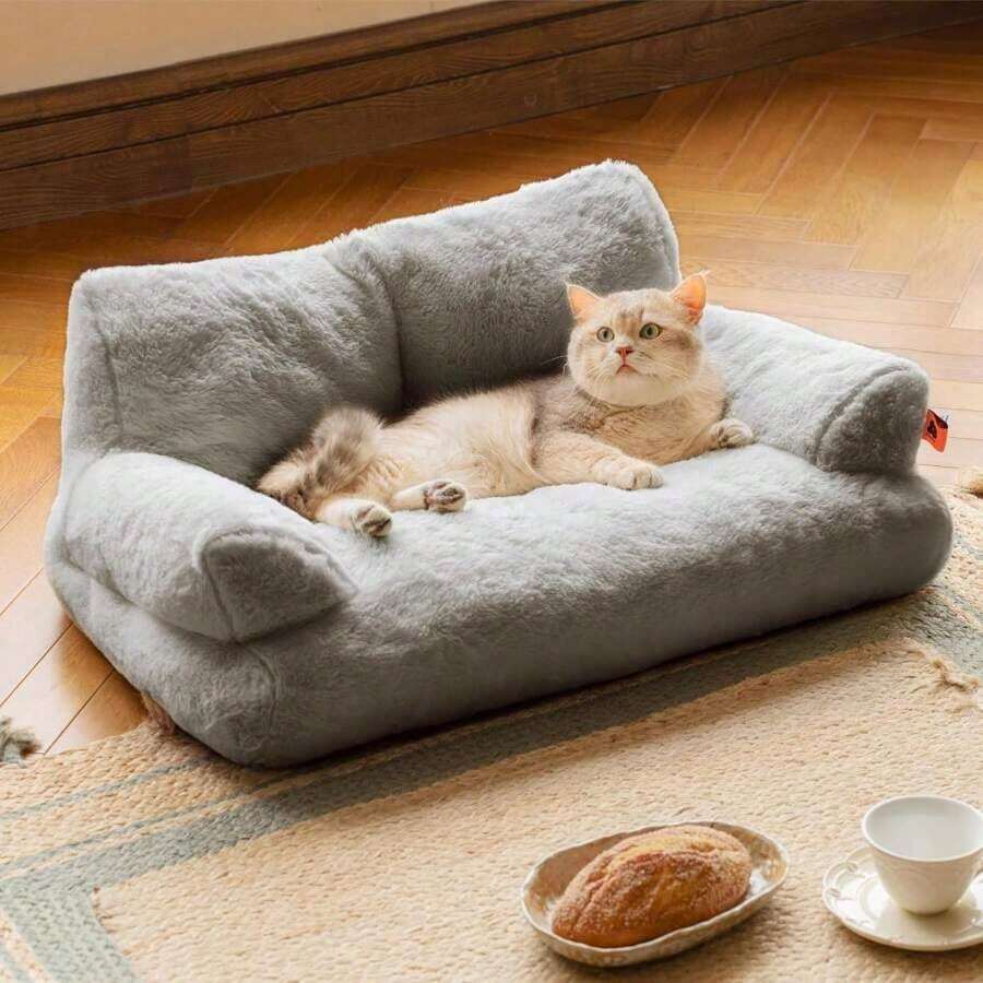 Orange plush cat sofa bed with high-resilience polyester filling and durable frame for small dogs and cats
