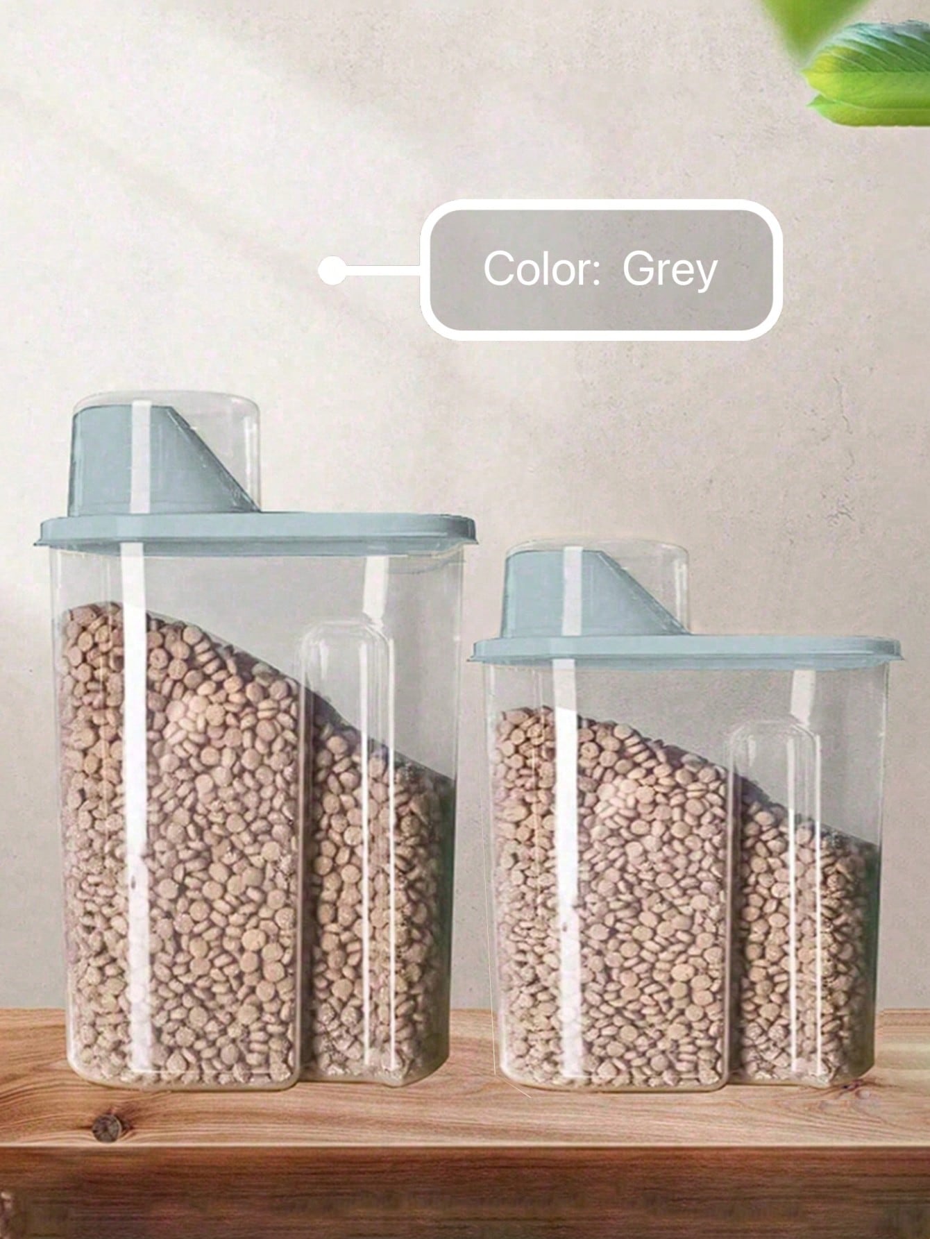 Grey sealed plastic pet food storage bin for storing cat and dog food and snacks.