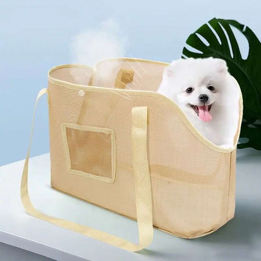 Beige breathable mesh dog carrier bag with shoulder straps for pet travel and outdoor walking