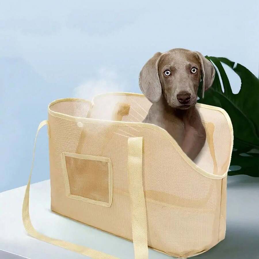 Beige breathable mesh dog carrier bag with shoulder straps for pet travel and outdoor walking