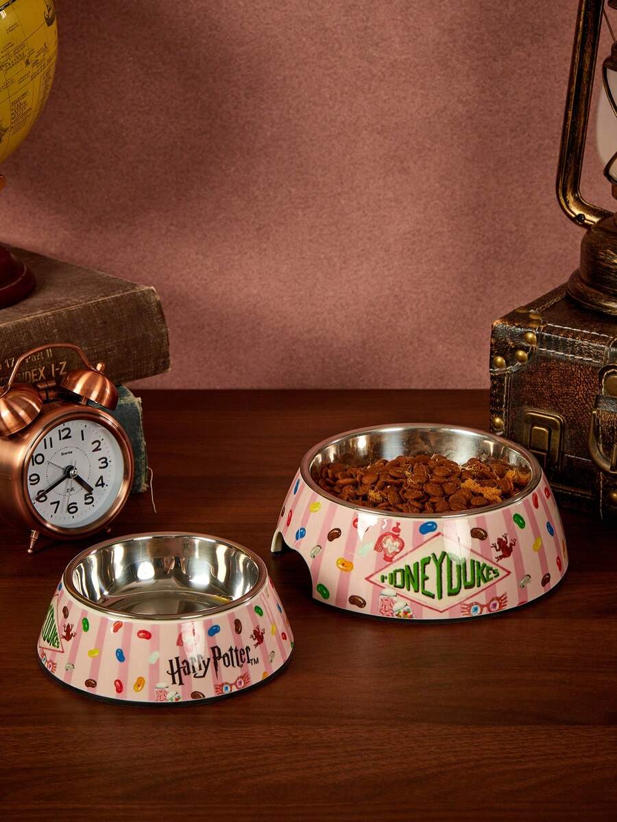 Dual-layer pet food dish with stainless steel liner and sleek non-skid melamine base for small animals.