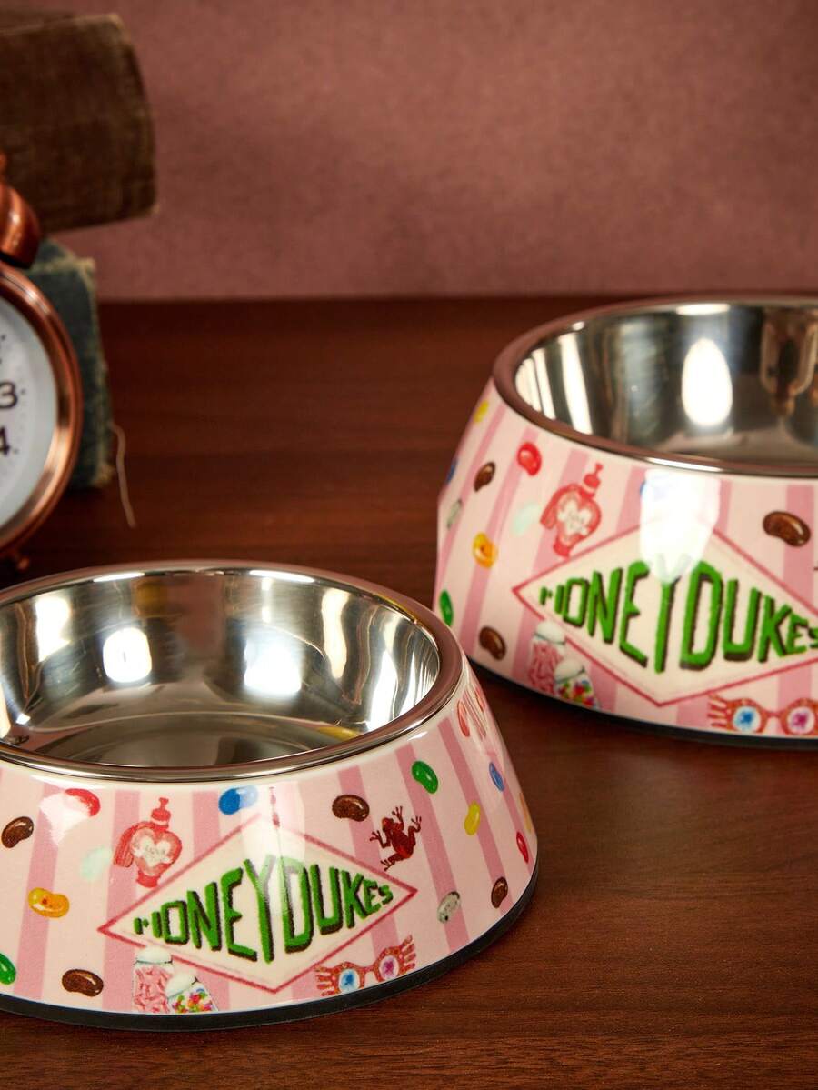 Dual-layer pet food dish with stainless steel liner and sleek non-skid melamine base for small animals.