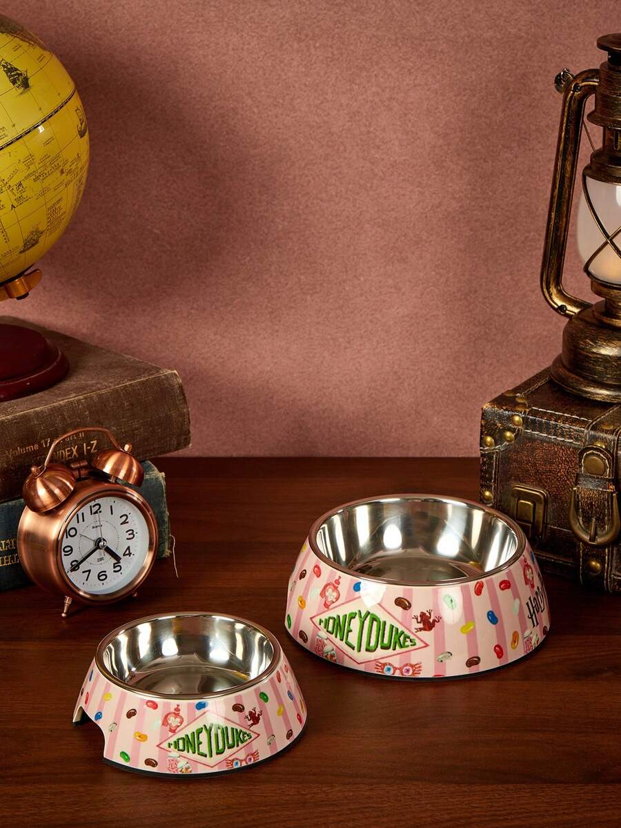 Dual-layer pet food dish with stainless steel liner and sleek non-skid melamine base for small animals.