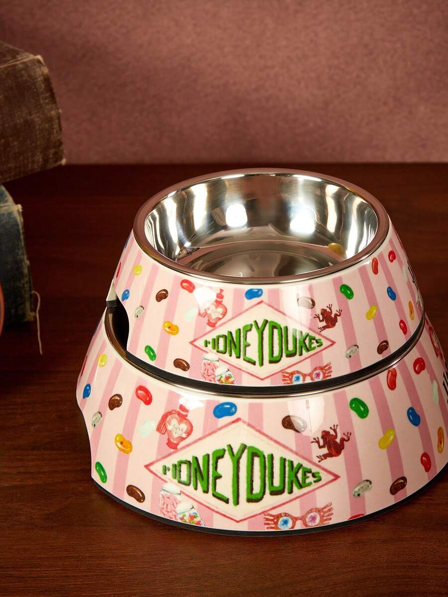 Dual-layer pet food dish with stainless steel liner and sleek non-skid melamine base for small animals.