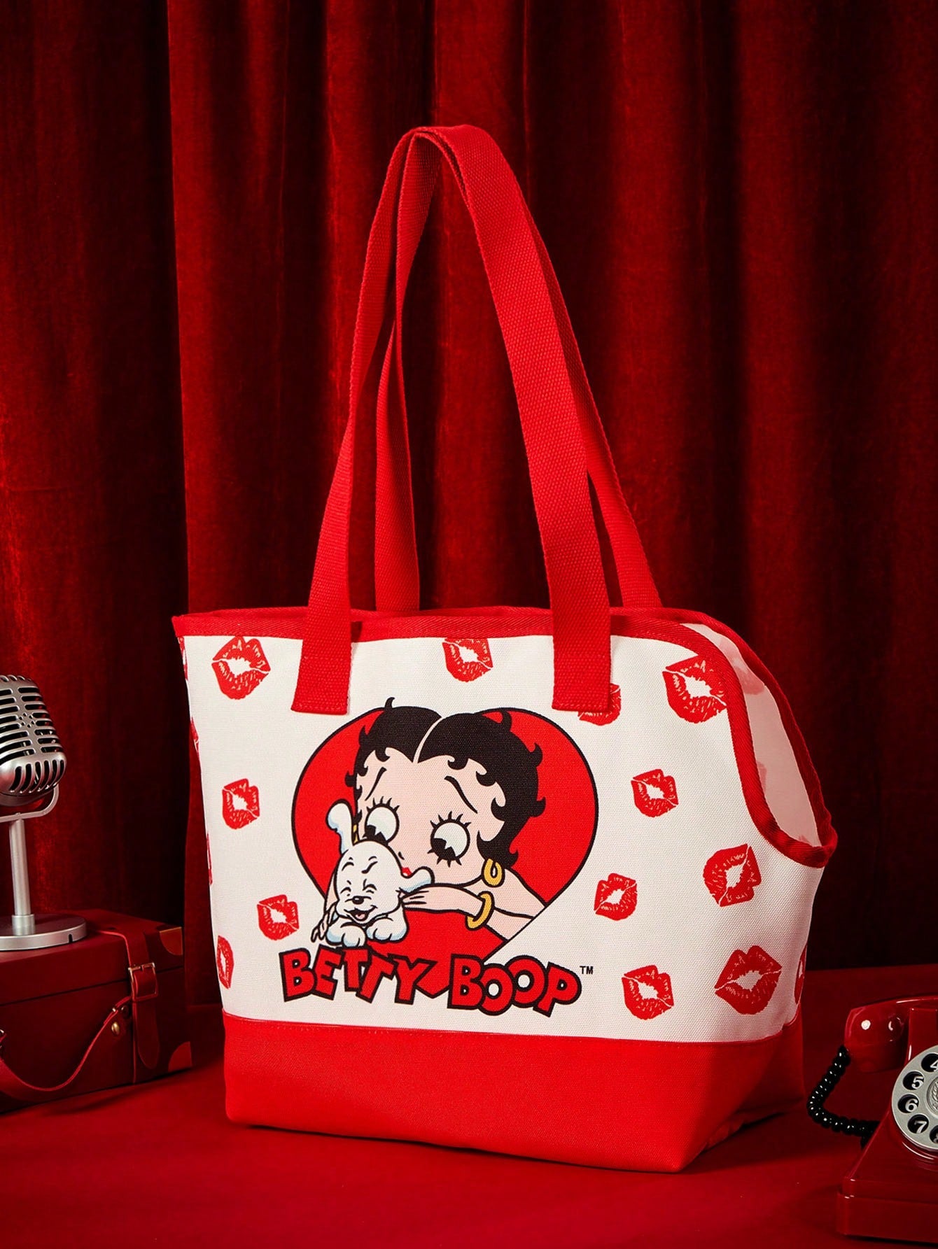 Striped pet tote bag carrier with red trim for small dogs and cats, made of 100% polyester.