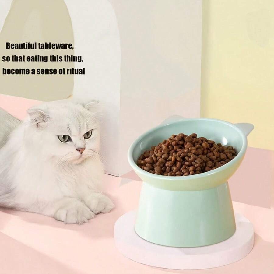 Set of 3 cat-ear shaped raised cat bowls in pink, green, and blue made of PMMA material with elevated anti-slip base