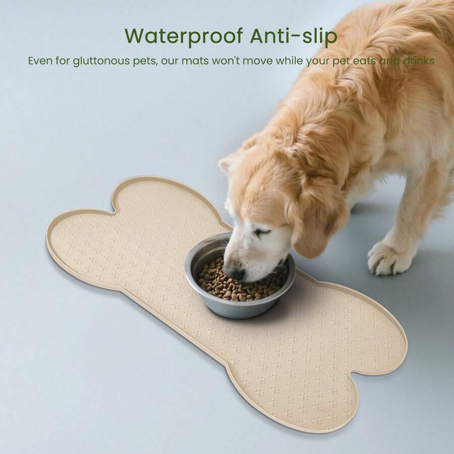 Multicolor bone-shaped silicone pet feeding mat with high spill-proof edge for cat and dog food and water bowls.