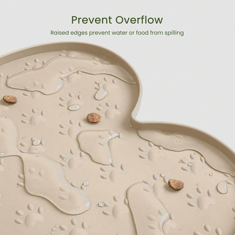 Multicolor bone-shaped silicone pet feeding mat with high spill-proof edge for cat and dog food and water bowls.