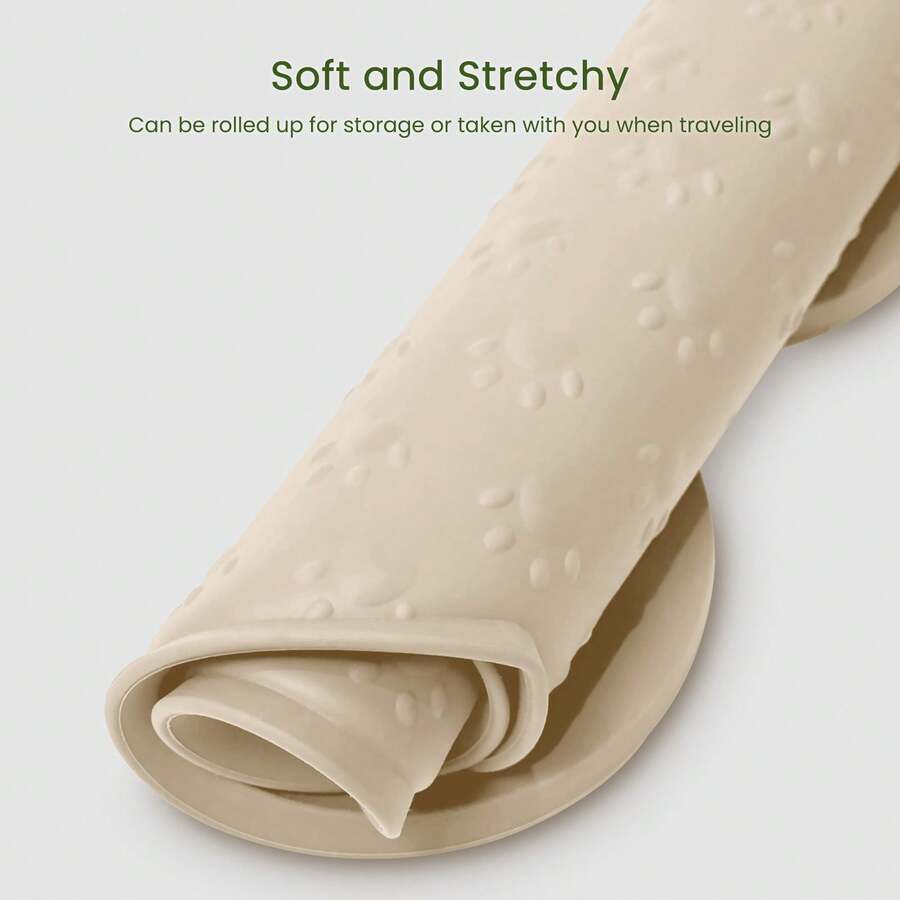 Multicolor bone-shaped silicone pet feeding mat with high spill-proof edge for cat and dog food and water bowls.