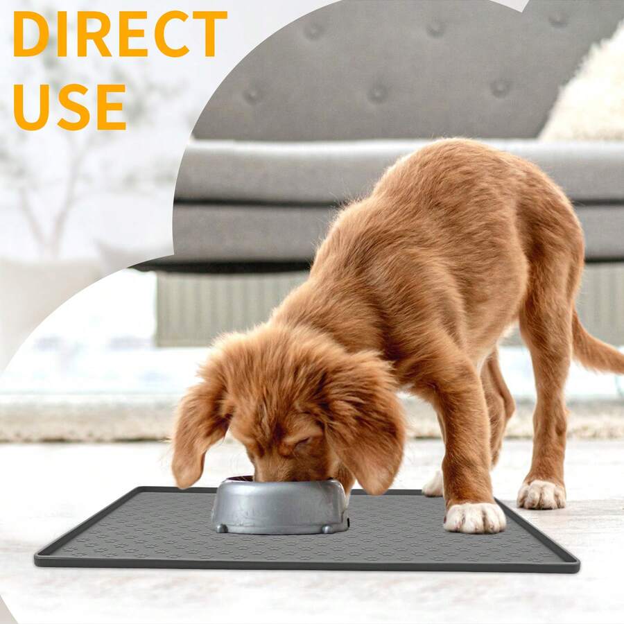 Beige silicone pet placemat with embossed paw print accents designed to catch food and water spills for dogs and cats.