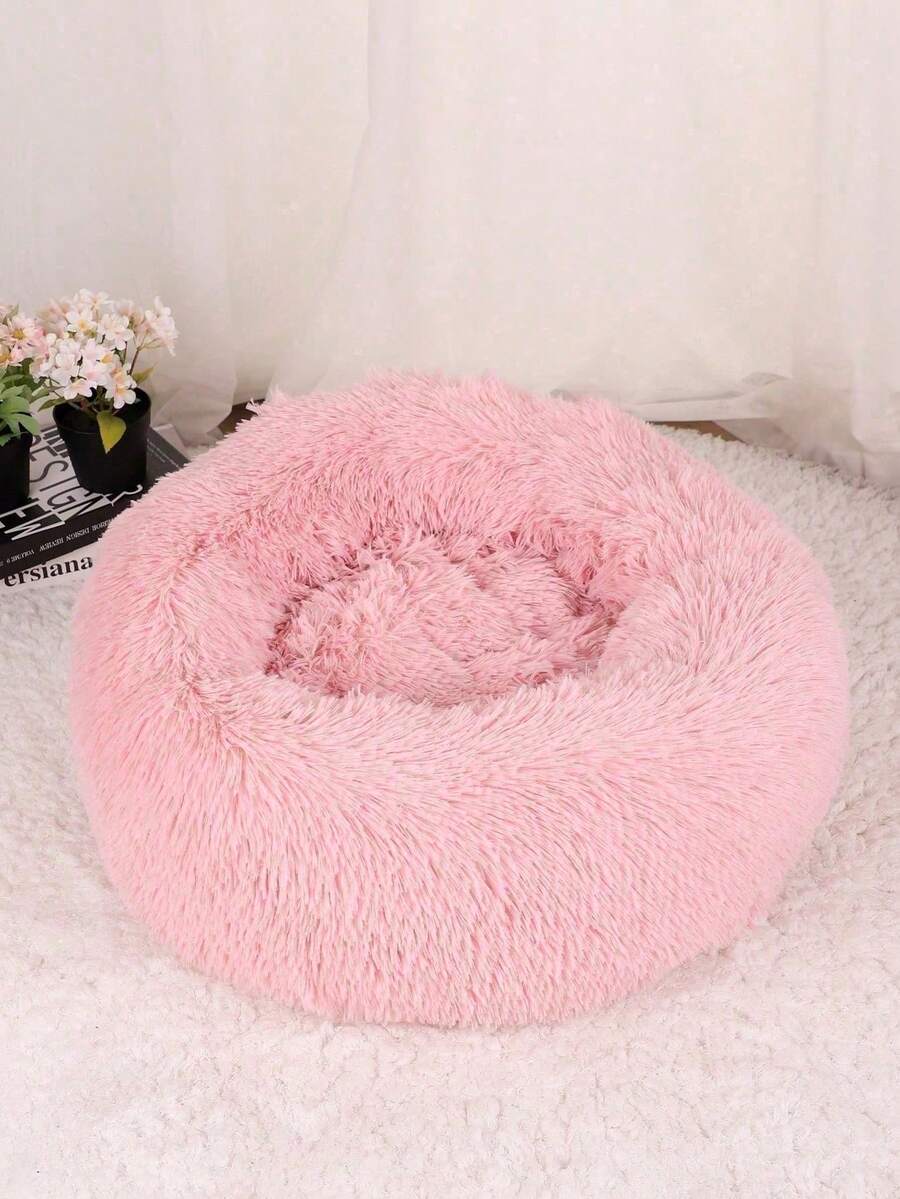 Pink plush round pet bed soft sleep cushion for cats and dogs filled with polypropylene fibers