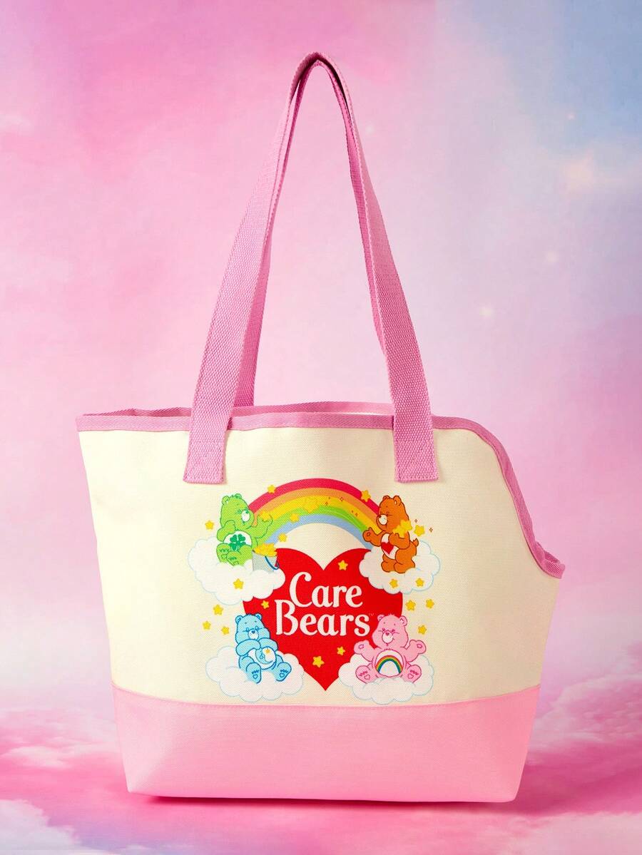 Pink and white canvas pet carrier tote bag with cute cartoon print, dual top handles, and shoulder strap for small dogs and cats.