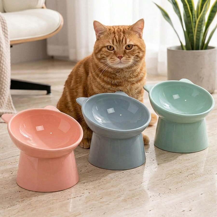 Set of 3 cat-ear shaped raised cat bowls in pink, green, and blue made of PMMA material with elevated anti-slip base